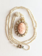 Load image into Gallery viewer, 19th C. Seed Pearl Angel Skin Coral Cameo Necklace
